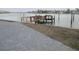 Pathway leading to a private dock on the water at 9901 1St E St # F, Treasure Island, FL 33706