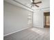 Spacious bedroom with ceiling fan and carpeted floor at 127 Silver Falls Dr, Apollo Beach, FL 33572