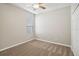 Spacious bedroom featuring ceiling fan and neutral wall tones at 127 Silver Falls Dr, Apollo Beach, FL 33572