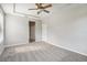Bright bedroom with ceiling fan and carpeted floor at 127 Silver Falls Dr, Apollo Beach, FL 33572
