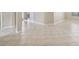 Light beige tile flooring throughout the main living area at 127 Silver Falls Dr, Apollo Beach, FL 33572