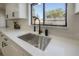 Modern kitchen sink with sleek faucet and quartz countertops at 12939 116Th St, Largo, FL 33778