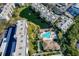 Complex overview; pool, pond and building at 1316 Pasadena S Ave # 203, South Pasadena, FL 33707