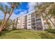 Building exterior with lush landscaping at 1316 Pasadena S Ave # 203, South Pasadena, FL 33707