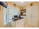Kitchen nook with additional counter space and storage at 1316 Pasadena S Ave # 203, South Pasadena, FL 33707