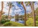 Serene pond with fountain and palm trees at 1316 Pasadena S Ave # 203, South Pasadena, FL 33707