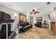 Comfortable living room with tile floors, a ceiling fan and a nearby treadmill at 224 7Th E St, Tierra Verde, FL 33715
