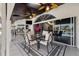 Outdoor patio with dining and seating area, ceiling fans, and overlooking the pool at 224 7Th E St, Tierra Verde, FL 33715