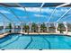 Screened-in pool with views of the canal at 224 7Th E St, Tierra Verde, FL 33715