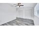 Bedroom with grey flooring, double closets and ceiling fan at 2254 66Th S Ave, St Petersburg, FL 33712