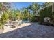 Lush tropical backyard oasis with a pool, patio, and water feature at 323 Coffee Pot Ne Dr, St Petersburg, FL 33704
