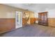Empty bedroom with brown walls and a door and open doorway at 323 Coffee Pot Ne Dr, St Petersburg, FL 33704