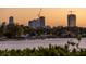 View of the city skyline across the water at sunset at 323 Coffee Pot Ne Dr, St Petersburg, FL 33704