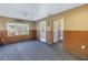 Open living area with access to outdoor space at 323 Coffee Pot Ne Dr, St Petersburg, FL 33704