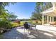 Patio with a dining set offering views of the waterfront and city skyline at 323 Coffee Pot Ne Dr, St Petersburg, FL 33704