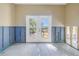Bright patio doors leading to a waterfront outdoor space at 323 Coffee Pot Ne Dr, St Petersburg, FL 33704