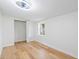 Bedroom with hardwood floors, a closet and window at 3458 17Th S Ave, St Petersburg, FL 33711