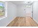 Bright bedroom with hardwood floors and a window at 3458 17Th S Ave, St Petersburg, FL 33711