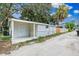 Newly renovated home with a covered porch and side yard at 3458 17Th S Ave, St Petersburg, FL 33711
