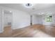 Light and airy living room with hardwood floors and access to other rooms at 3458 17Th S Ave, St Petersburg, FL 33711