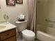 Bright bathroom including a shower and tub combination at 3480 Hillmoor Dr, Palm Harbor, FL 34685