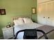 Cozy bedroom offering natural light and ample closet space at 3480 Hillmoor Dr, Palm Harbor, FL 34685