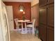 Bright kitchen nook with a small table and chairs, perfect for casual dining at 3480 Hillmoor Dr, Palm Harbor, FL 34685