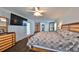 Spacious main bedroom with large bed and plenty of light at 4005 Foxtail Palm Ct, Tampa, FL 33624