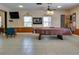 Community game room features a pool table and comfortable seating at 4215 E Bay Dr # 104, Clearwater, FL 33764