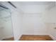 Large walk-in closet with wire shelving providing ample storage space at 514 Ryans Woods Ln, Palm Harbor, FL 34683