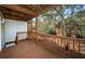 Wooden deck overlooks a wooded area, providing a peaceful outdoor space at 514 Ryans Woods Ln, Palm Harbor, FL 34683