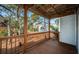 Wooden deck overlooking a wooded backyard at 514 Ryans Woods Ln, Palm Harbor, FL 34683
