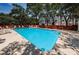 Community pool with lounge chairs and a 5ft depth marker at 514 Ryans Woods Ln, Palm Harbor, FL 34683