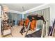 Home exercise room with treadmill and exercise bike at 7725 Forest Trl # 2, Port Richey, FL 34668