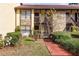 Charming two-story condo with stone accents, private entrances, and well-maintained landscaping at 7725 Forest Trl # 2, Port Richey, FL 34668