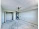 Bedroom with ceiling fan, closet, and entrance to another room at 8198 Terrace Garden N Dr # 407, St Petersburg, FL 33709