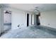 Spacious bedroom with ceiling fan and closet at 8198 Terrace Garden N Dr # 407, St Petersburg, FL 33709