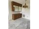 Empty dining area with built-in hutch and mirrored cabinets at 8198 Terrace Garden N Dr # 407, St Petersburg, FL 33709