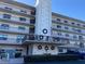 Building exterior featuring a multi-story building with balconies and landscaping at 8198 Terrace Garden N Dr # 407, St Petersburg, FL 33709