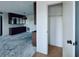 The living room has a built-in cabinet and large window at 8198 Terrace Garden N Dr # 407, St Petersburg, FL 33709