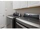 Laundry room with LG washer and dryer at 8727 Savory Walk Dr, Land O Lakes, FL 34637