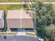 Aerial view of house showing roofline and landscaping at 9022 Ramsgate Dr # 9022, New Port Richey, FL 34655