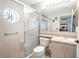 Clean bathroom with a shower/tub combo and updated vanity at 9022 Ramsgate Dr # 9022, New Port Richey, FL 34655