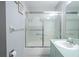 Clean bathroom with a tub and shower, and a modern vanity at 9022 Ramsgate Dr # 9022, New Port Richey, FL 34655