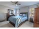 Spacious bedroom with a comfortable bed and ample closet space at 9022 Ramsgate Dr # 9022, New Port Richey, FL 34655