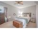 Cozy bedroom with a queen-size bed and calming decor at 9022 Ramsgate Dr # 9022, New Port Richey, FL 34655