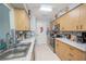 Updated kitchen with granite countertops and stylish cabinetry at 9022 Ramsgate Dr # 9022, New Port Richey, FL 34655