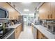 Bright kitchen with stainless steel appliances and ample cabinetry at 9022 Ramsgate Dr # 9022, New Port Richey, FL 34655