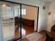 Open balcony area leading to a bedroom, providing natural light and outside views at 10 Woodridge Cir, Oldsmar, FL 34677
