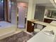 Bathroom featuring a walk-in shower, toilet, and sink vanity at 10 Woodridge Cir, Oldsmar, FL 34677